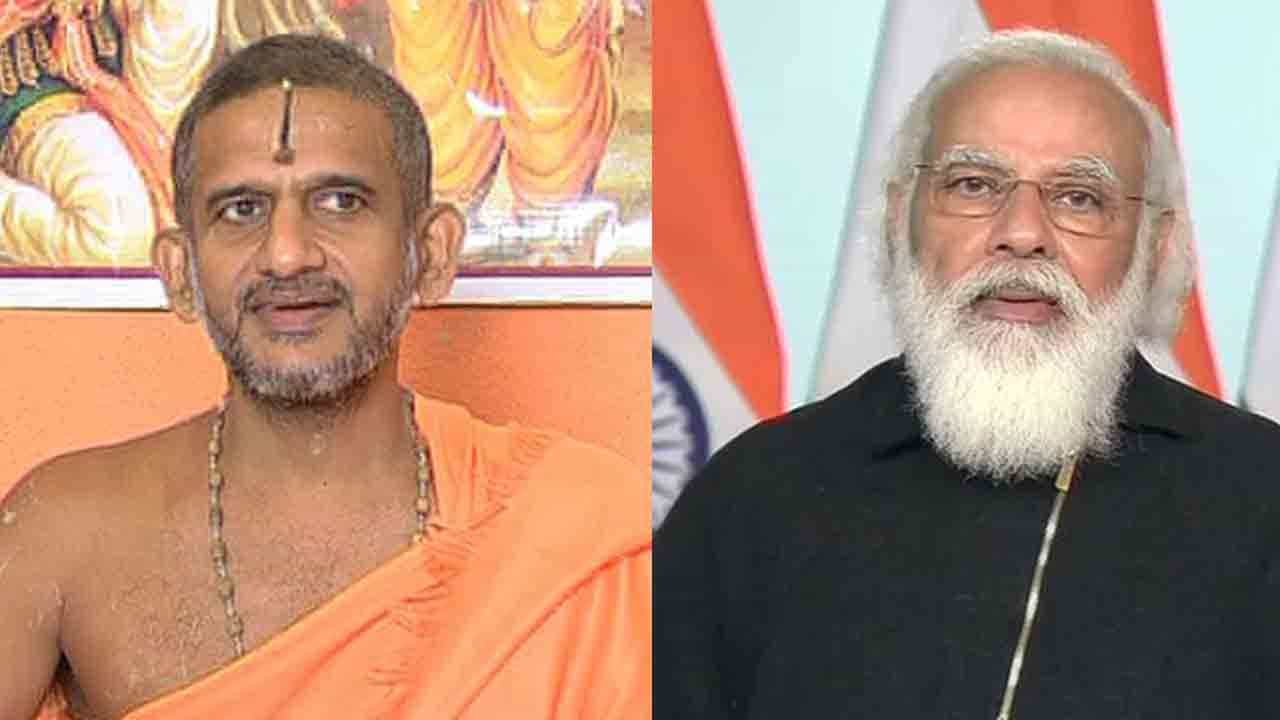 ಅಖಂಡ ಪ್ರತಿಜ್ಞೆ: ಪ್ರಧಾನಿ ಮೋದಿಯ ಉದ್ದನೆಯ ಕೇಶದ ಹಿಂದಿನ ಕಾರಣ ಬಿಚ್ಚಿಟ್ಟ ಪೇಜಾವರ ಶ್ರೀಗಳು