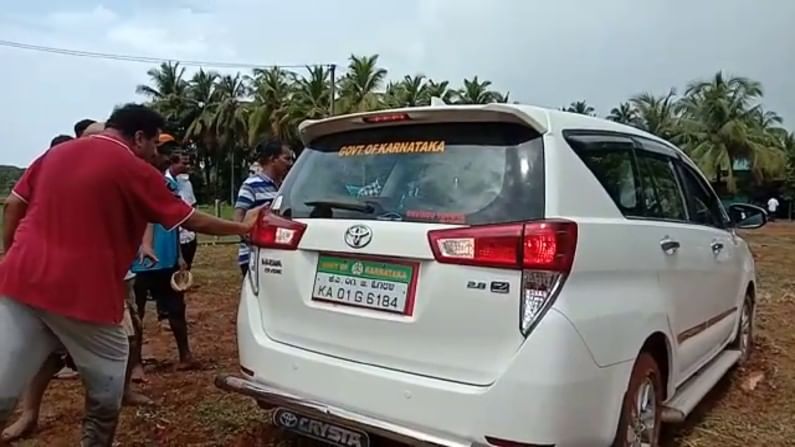 agriculture minister BC Patil car slides on mud road near udupi 1