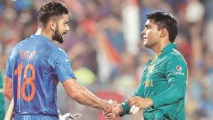 Virat Kohli and Kamran Akmal 