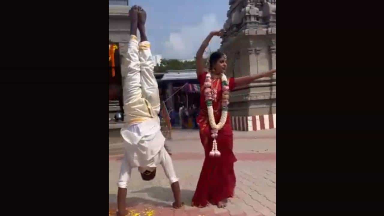 Viral Video: ಪ್ರೀ ವೆಡ್ಡಿಂಗ್ ಫೋಟೋ ಶೂಟ್ಗಾಗಿ ತಲೆಕೆಳಗಾಗಿ ನಿಂತ ಯುವಕ Viral Video: ಪ್ರೀ ವೆಡ್ಡಿಂಗ್ ಫೋಟೋ ಶೂಟ್ಗಾಗಿ ತಲೆಕೆಳಗಾಗಿ ನಿಂತ ಯುವಕ