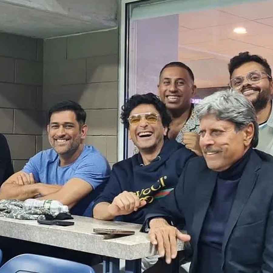 The US Open also featured two World Cup-winning captains in the same setting.  Dhoni and Kapil Dev competed in a grand slam together. 