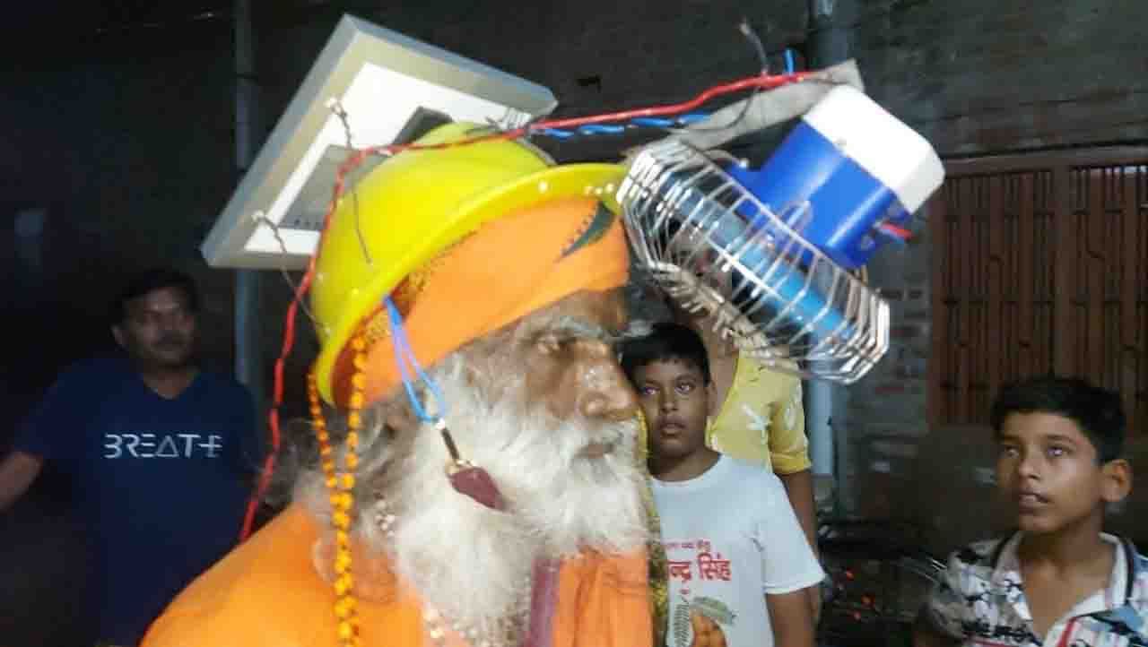 UP man beats the heat with solar-powered fan attached to his helmet