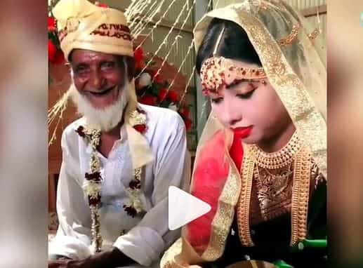 Viral Video: 20 ವರ್ಷದ ಆಸುಪಾಸಿನ ಹುಡ್ಗಿಯನ್ನು ಮದ್ವೆಯಾದ ಬಚ್ಚು ಬಾಯಿ ಮುದುಕನ ಖುಷಿಗೆ ಪಾರವೇ ಇಲ್ಲ Viral Video: 20 ವರ್ಷದ ಆಸುಪಾಸಿನ ಹುಡ್ಗಿಯನ್ನು ಮದ್ವೆಯಾದ ಬಚ್ಚು ಬಾಯಿ ಮುದುಕನ ಖುಷಿಗೆ ಪಾರವೇ ಇಲ್ಲ