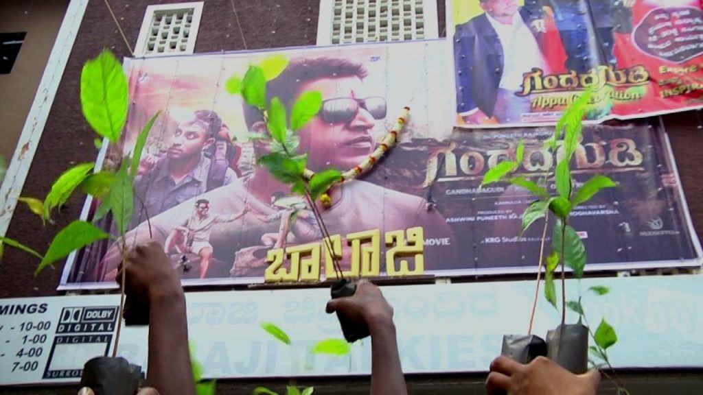 Puneeth Rajkumar fans distribute Sandalwood saplings while watching Gandhada Gudi cinema in Chikkaballapur 1