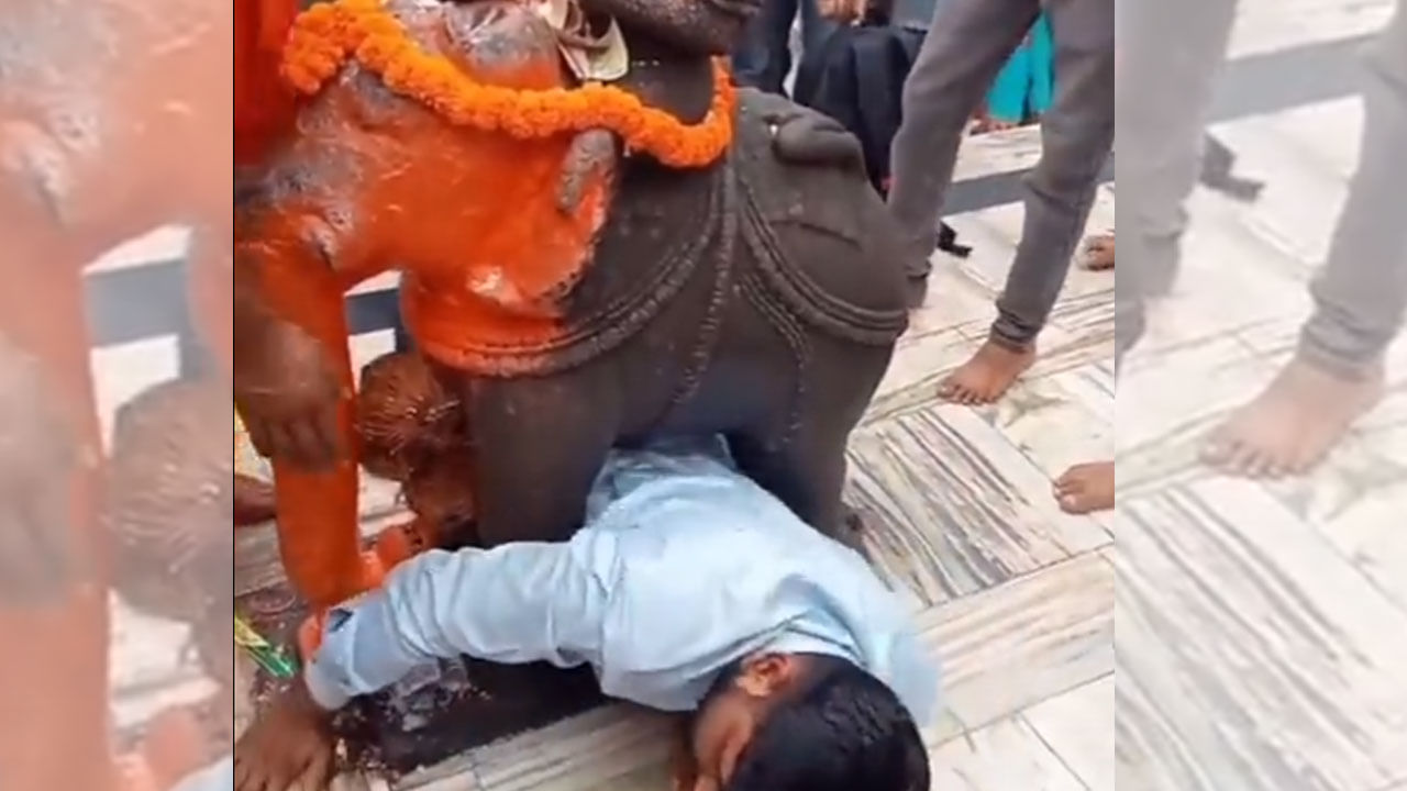 ಗುಜರಾತ್ನ ದೇವಾಲಯದ ಆನೆ ವಿಗ್ರಹದಡಿಯಲ್ಲಿ ಸಿಲುಕಿದ ಭಕ್ತ; ಇಷ್ಟೊಂದು ಭಕ್ತಿ ಒಳ್ಳೇದಲ್ಲ ಎಂದ ನೆಟ್ಟಿಗರು