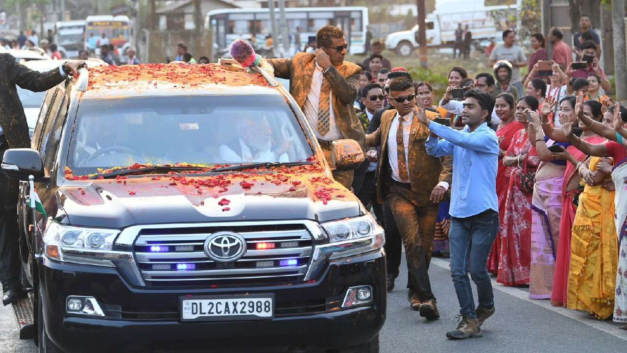 Assam PM Modi receive a grand welcome at Guwahati Modi road show photos 
