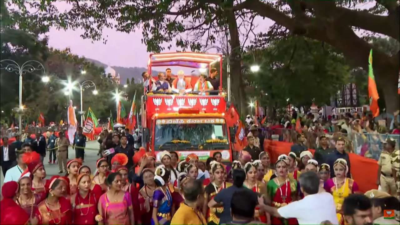 PM Modi Road Show in Mysuru Narendra Modi roadshow from Vidyapeetha Circle to Highway Circle in Mysuru 
