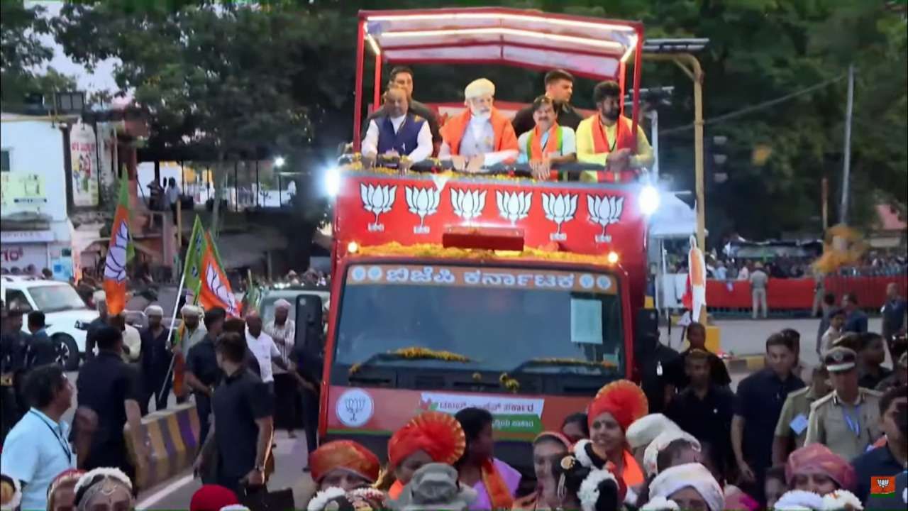 PM Modi Road Show in Mysuru Narendra Modi roadshow from Vidyapeetha Circle to Highway Circle in Mysuru 
