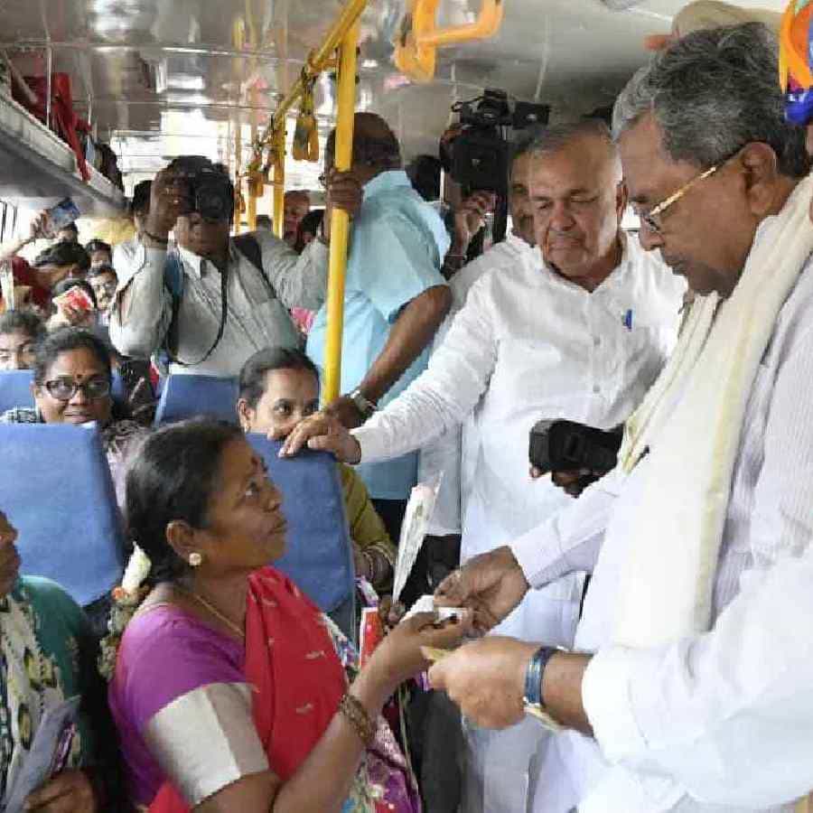Shakti Scheme Grandmother enter the bus after saluting in Dharwad photo goes viral