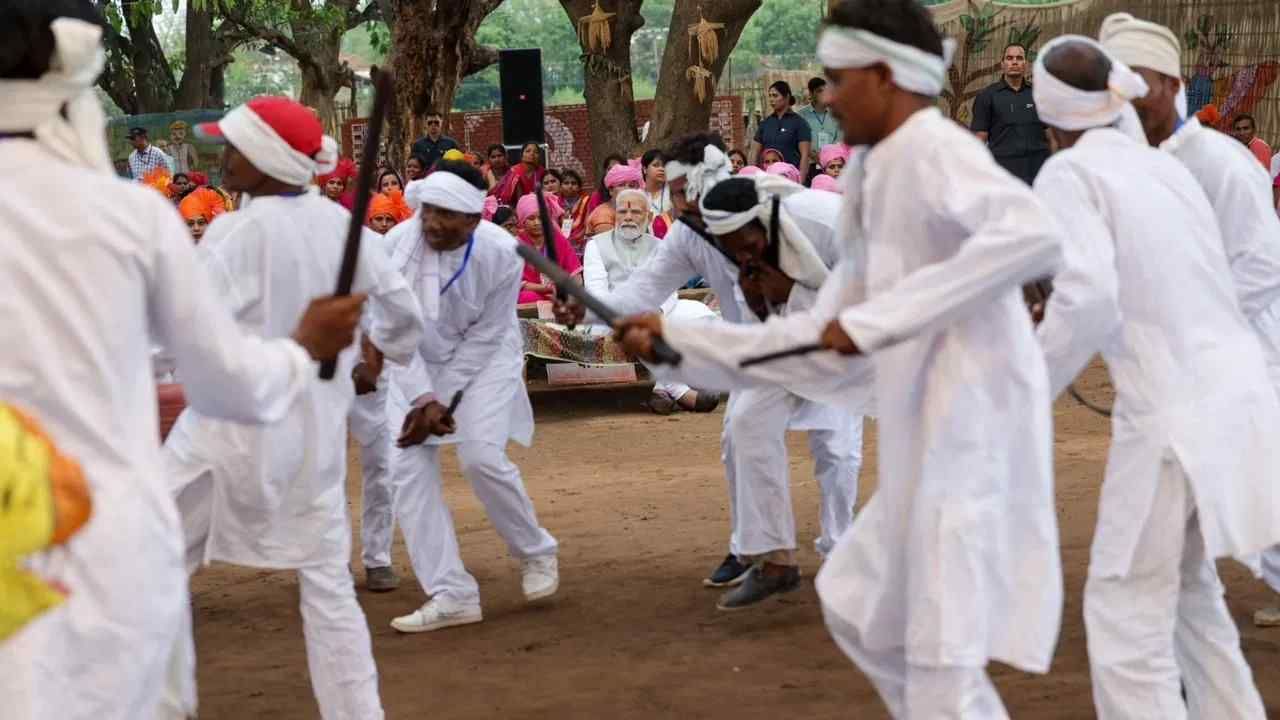 PM Modi in Shahdol PM Modi visits Pakaria interacts with people from tribal communities Check out the photos here
