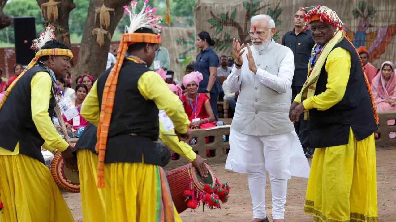 PM Modi in Shahdol PM Modi visits Pakaria interacts with people from tribal communities Check out the photos here
