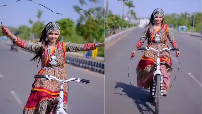 ಯುವತಿ ಸೈಕಲ್ ಸವಾರಿ ಮಾಡುತ್ತಾ, ಸ್ಕಿಪ್ಪಿಂಗ್ ಮಾಡಿರುವ ವಿಡಿಯೋ ನೋಡಿ ಯುವತಿ ಸೈಕಲ್ ಸವಾರಿ ಮಾಡುತ್ತಾ, ಸ್ಕಿಪ್ಪಿಂಗ್ ಮಾಡಿರುವ ವಿಡಿಯೋ ನೋಡಿ