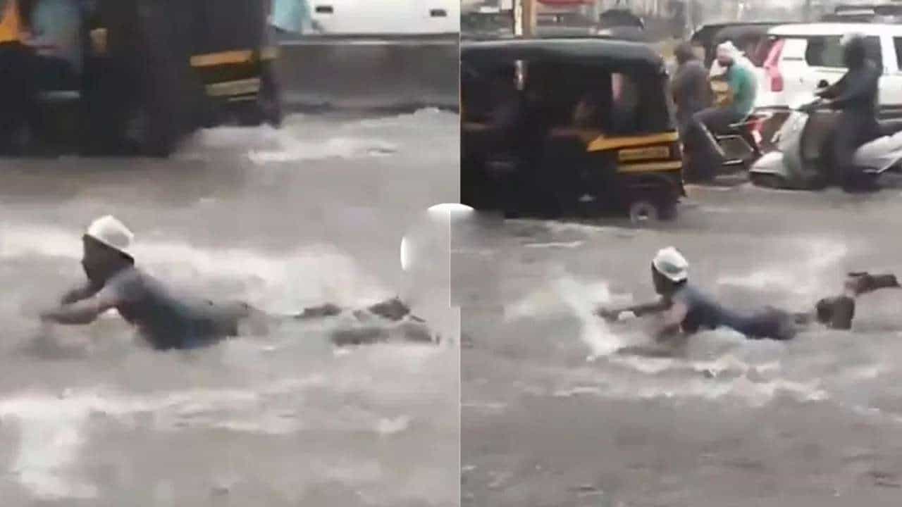 Video Viral: ಇದು ರಸ್ತೆಯಲ್ಲ, ಈಜುಕೊಳ; ಮಳೆಗೆ ನಡು ರಸ್ತೆಯಲ್ಲೇ ಈಜಾಡಿದ ವ್ಯಕ್ತಿ Video Viral: ಇದು ರಸ್ತೆಯಲ್ಲ, ಈಜುಕೊಳ; ಮಳೆಗೆ ನಡು ರಸ್ತೆಯಲ್ಲೇ ಈಜಾಡಿದ ವ್ಯಕ್ತಿ