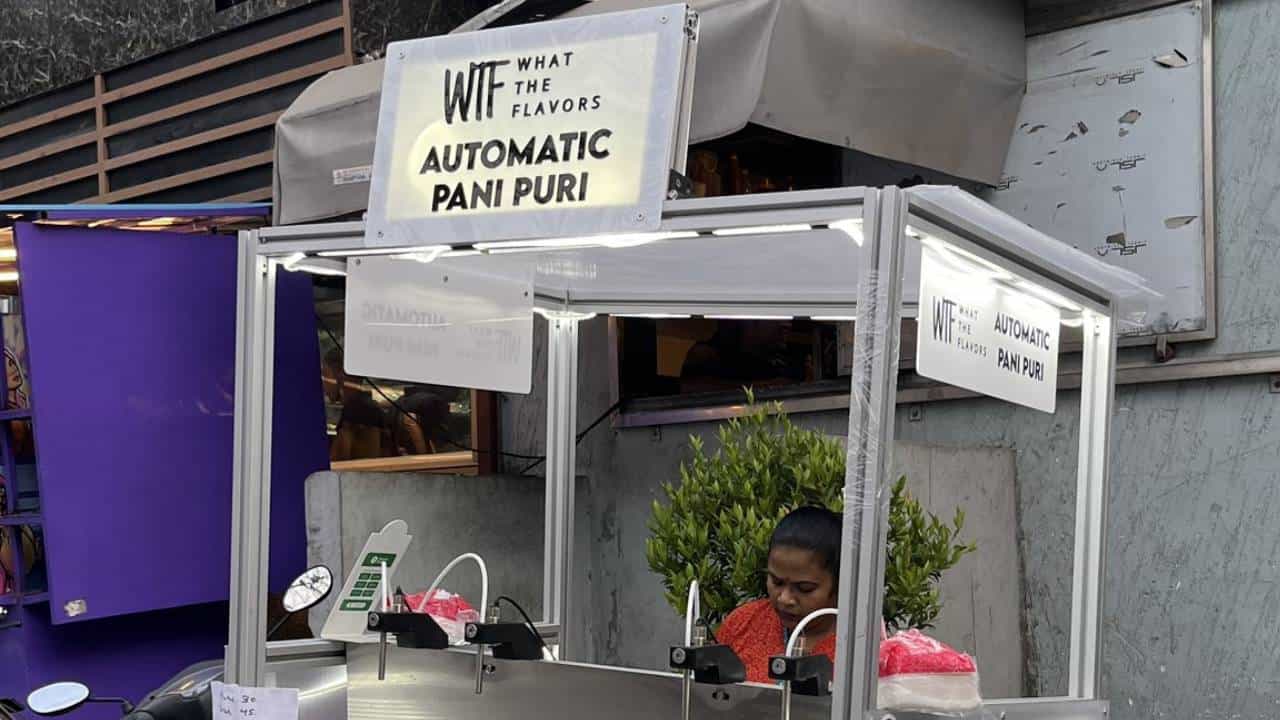 Automatic Pani Puri Kiosk: ಬೆಂಗಳೂರಿನ ಹೆಚ್ಎಸ್ಆರ್ ಲೇಔಟ್ಗೆ ಕಾಲಿಟ್ಟಿದೆ ಪಾನಿಪುರಿ ವೆಂಡಿಂಗ್ ಮಷಿನ್ Automatic Pani Puri Kiosk: ಬೆಂಗಳೂರಿನ ಹೆಚ್ಎಸ್ಆರ್ ಲೇಔಟ್ಗೆ ಕಾಲಿಟ್ಟಿದೆ ಪಾನಿಪುರಿ ವೆಂಡಿಂಗ್ ಮಷಿನ್