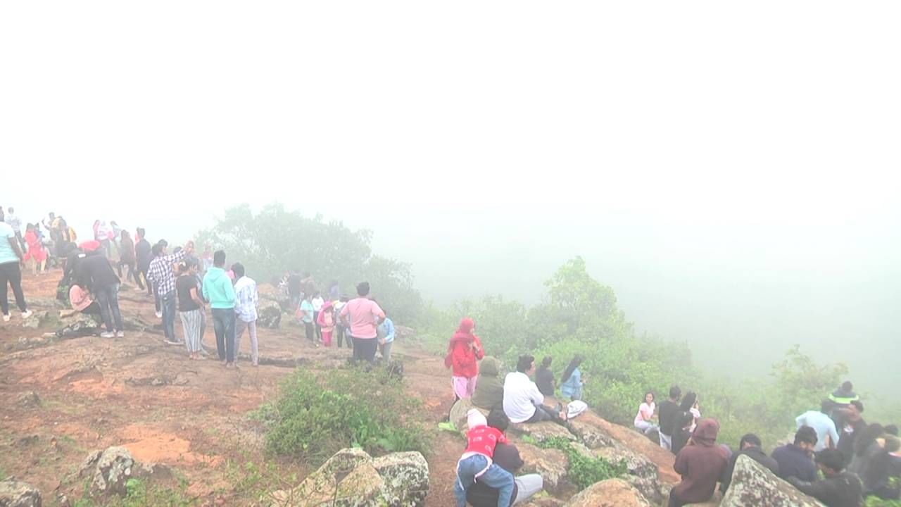 Lots of tourists arriving to beautiful view point Chitradurga Jogimatti forest area