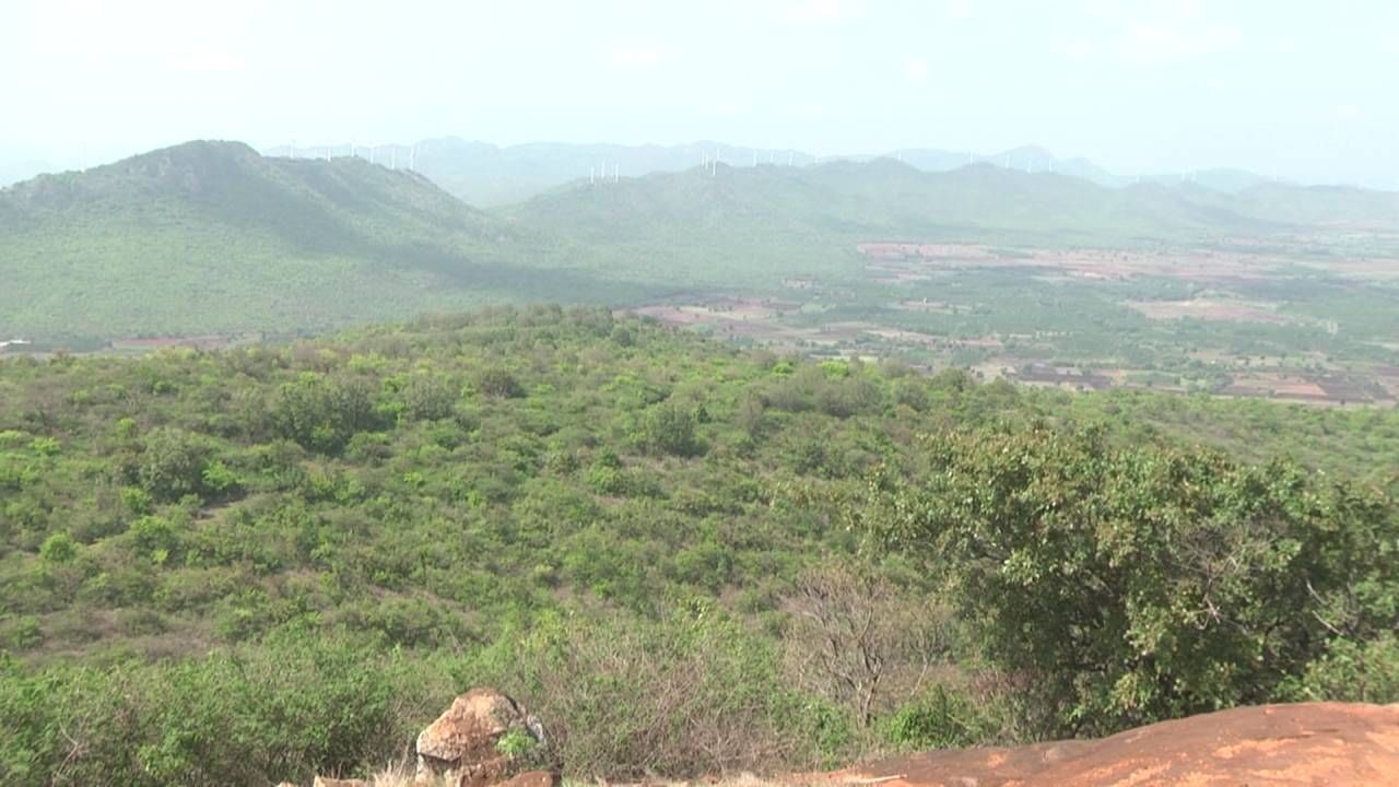 Lots of tourists arriving to beautiful view point Chitradurga Jogimatti forest area