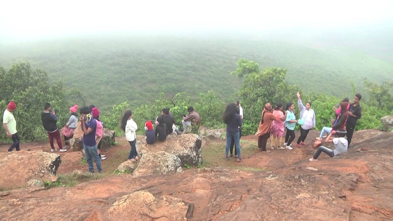 Lots of tourists arriving to beautiful view point Chitradurga Jogimatti forest area