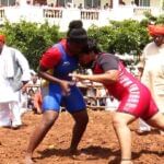 Desi wrestlers perform in the arena of Kotenadu Chitradurga