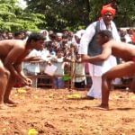 Desi wrestlers perform in the arena of Kotenadu Chitradurga