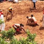 Desi wrestlers perform in the arena of Kotenadu Chitradurga