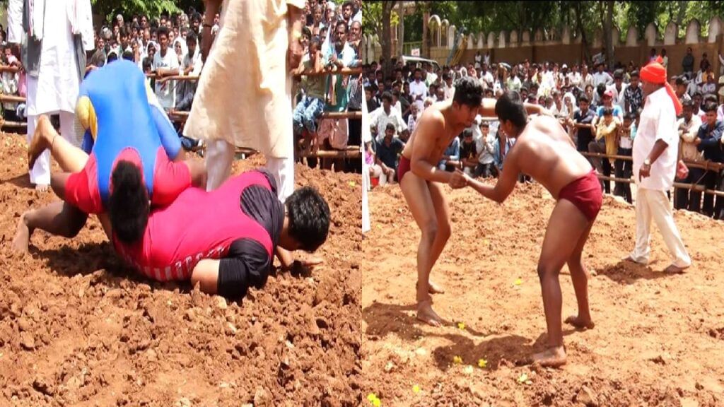 Desi wrestlers perform in the arena of Kotenadu Chitradurga