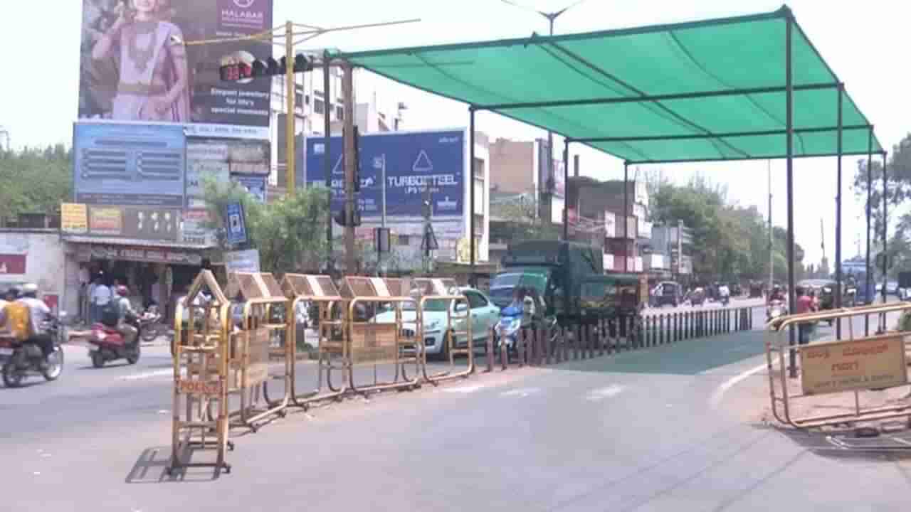 ಸುಡುವ ಬಿಸಿಲಿಗೆ ಸವಾರರು ಹೈರಾಣು: ಟ್ರಾಫಿಕ್​ ಸಿಗ್ನಲ್​​ನಲ್ಲಿ ನೆರಳಿನ ವ್ಯವಸ್ಥೆ, ಪೊಲೀಸರ ಕಾರ್ಯಕ್ಕೆ ಮೆಚ್ಚುಗೆ