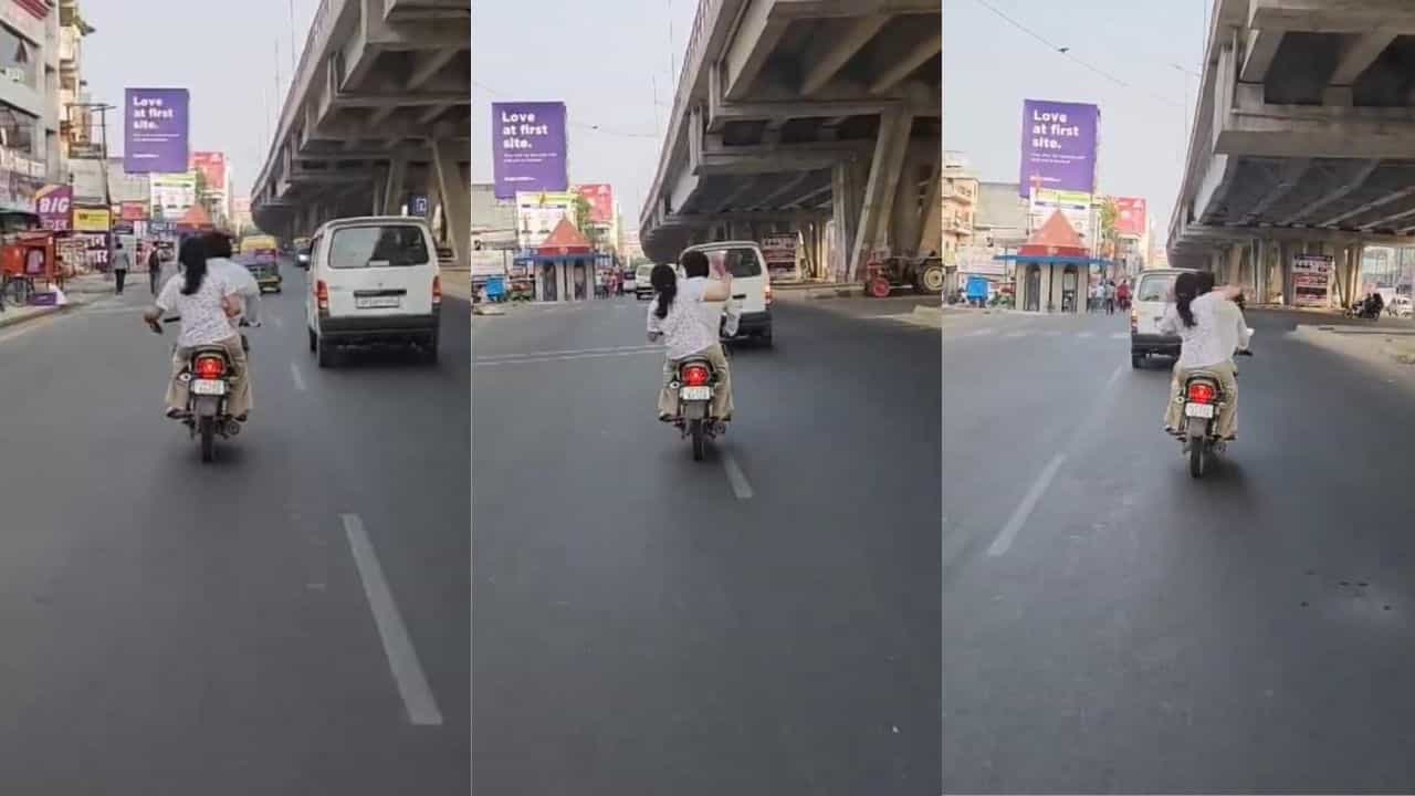 ಬೈಕ್ ಓಡಿಸುತ್ತಿದ್ದ ಗಂಡನಿಗೆ ಚಪ್ಪಲಿಯಲ್ಲಿ ಹಿಗ್ಗಾಮುಗ್ಗಾ ಬಾರಿಸಿದ ಹೆಂಡತಿ ಬೈಕ್ ಓಡಿಸುತ್ತಿದ್ದ ಗಂಡನಿಗೆ ಚಪ್ಪಲಿಯಲ್ಲಿ ಹಿಗ್ಗಾಮುಗ್ಗಾ ಬಾರಿಸಿದ ಹೆಂಡತಿ