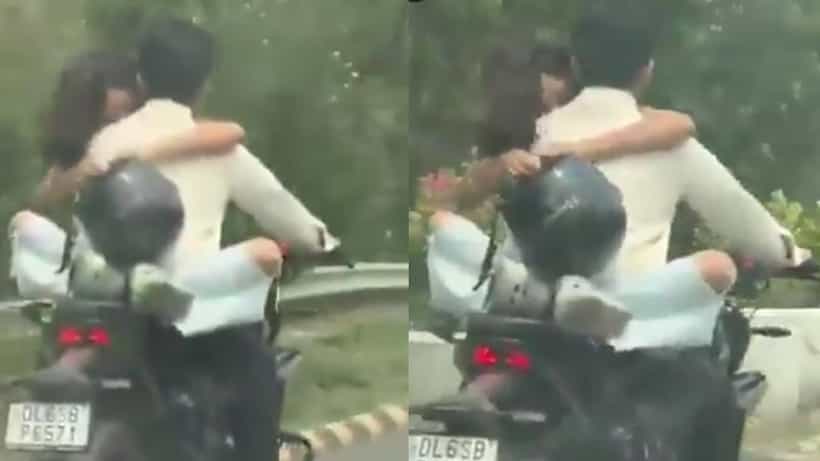 ಚಲಿಸುವ ಬೈಕ್ನಲ್ಲಿ ಪ್ರೇಮಿಗಳ ರೊಮ್ಯಾನ್ಸ್, ಬಿಸಿ ಮುಟ್ಟಿಸಿದ ಪೊಲೀಸರು