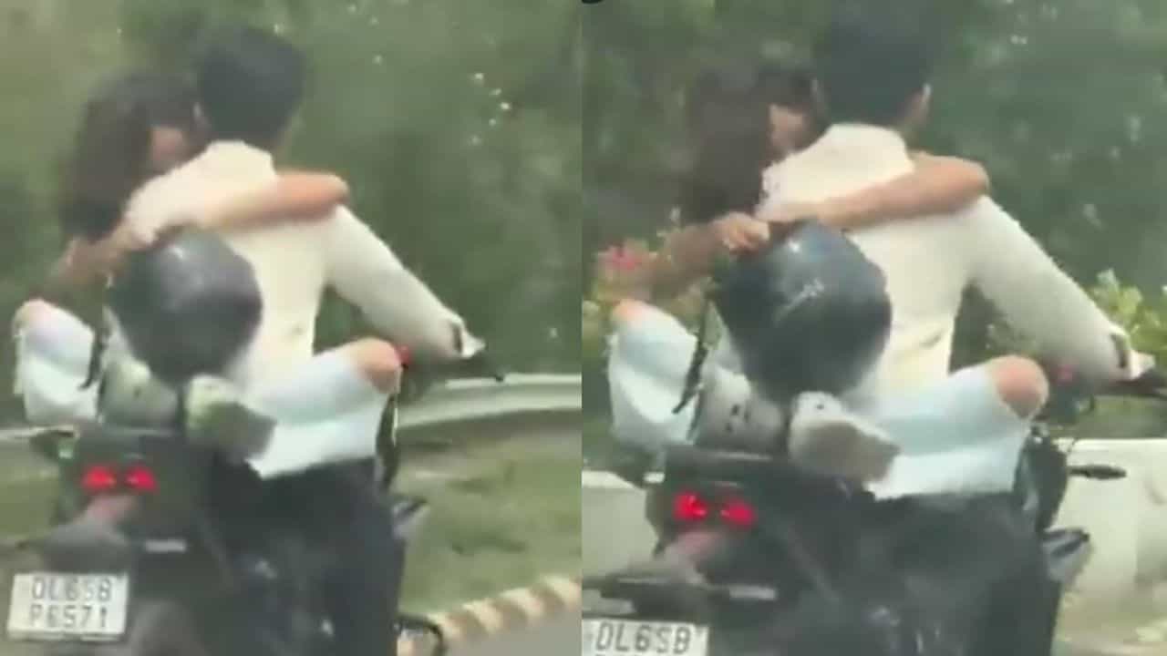 ಚಲಿಸುವ ಬೈಕ್‌ನಲ್ಲಿ ಪ್ರೇಮಿಗಳ ರೊಮ್ಯಾನ್ಸ್, ಬಿಸಿ ಮುಟ್ಟಿಸಿದ ಪೊಲೀಸರು