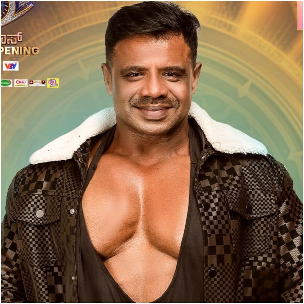 ಕರಿ ಬಸಪ್ಪ: ಬಾಡಿ ಬಿಲ್ಡರ್ ಆಗಿ ಫೇಮಸ್ ಆದ ಕರಿ ಬಸಪ್ಪ ದೊಡ್ಮನೆಗೆ ಬಂದಿದ್ದಾರೆ. ಅವರು ಸಾಕಷ್ಟು ಸಾಧನೆ ಮಾಡಿದ್ದಾರೆ.