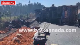 ನೆಲಮಂಗಲದ ಬಳಿ ಆರೆಂಜ್ ತುಂಬಿದ ಲಾರಿ ಪಲ್ಟಿ