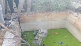 ಸೆಪ್ಟಿಕ್ ಟ್ಯಾಂಕ್ ಒಳಗೆ ಕಬ್ಬಿಣದ ಟ್ರಂಕ್​ನಲ್ಲಿ ಮಹಿಳೆಯ ಶವ ಪತ್ತೆ