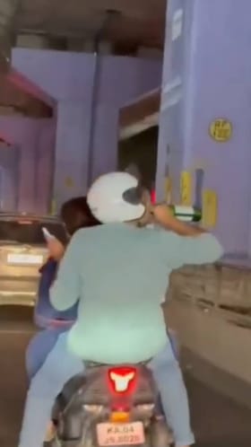 ಬಿಯರ್​ ಕುಡಿಯುತ್ತಾ ಬೈಕ್​ನಲ್ಲಿ ಯುವಕರ ತ್ರಿಬಲ್ ರೈಡಿಂಗ್​​