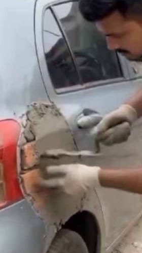 ಇಟ್ಟಿಗೆ, ಸಿಮೆಂಟ್​ ಮೆತ್ತಿ ಕಾರು ರಿಪೇರಿ ಮಾಡಿದ ಪುಣ್ಯಾತ್ಮ!