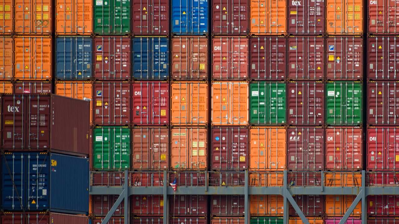 Container ships in Singapore port, symbolizing India's new export market.