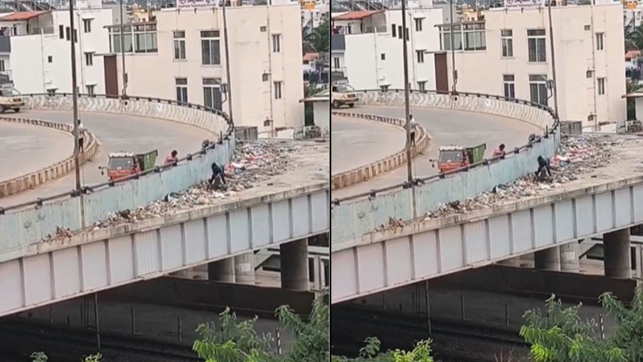Heap of garbage under JP Park flyover in Bengaluru, causing foul smell.