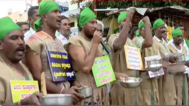 ಬೈಪಾಸ್ಗೆ ಆಗ್ರಹಿಸಿ ಕಗ್ಗಲಿಪುರ ನಿವಾಸಿಗಳಿಂದ ವಿನೂತನ ಪ್ರತಿಭಟನೆ: ದೇಹಕ್ಕೆ ಗೋಣಿ ಚೀಲ ಕಟ್ಟಿಕೊಂಡು ಭಿಕ್ಷಾಟನೆ ಬೈಪಾಸ್ಗೆ ಆಗ್ರಹಿಸಿ ಕಗ್ಗಲಿಪುರ ನಿವಾಸಿಗಳಿಂದ ವಿನೂತನ ಪ್ರತಿಭಟನೆ: ದೇಹಕ್ಕೆ ಗೋಣಿ ಚೀಲ ಕಟ್ಟಿಕೊಂಡು ಭಿಕ್ಷಾಟನೆ