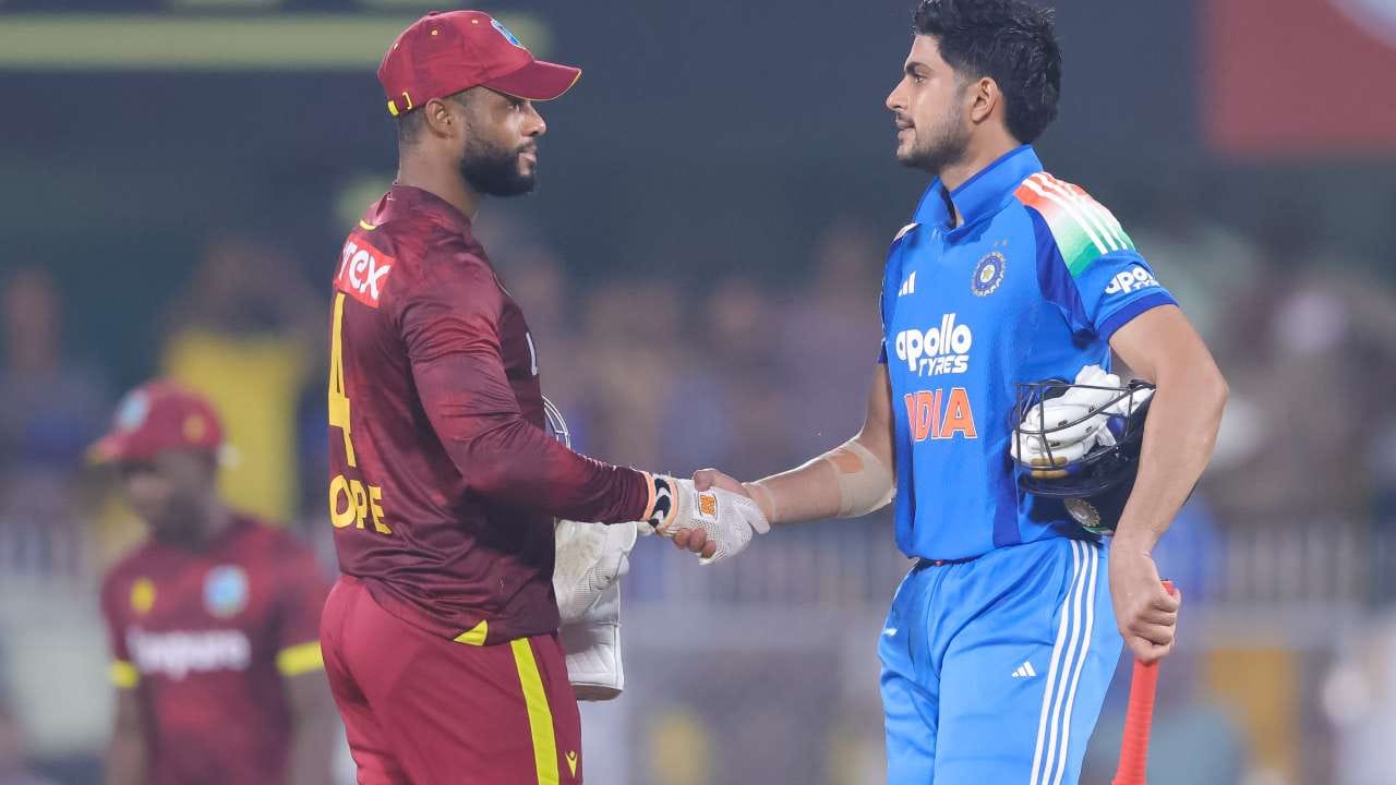 Indian and West Indian cricketers in action during a T20 match